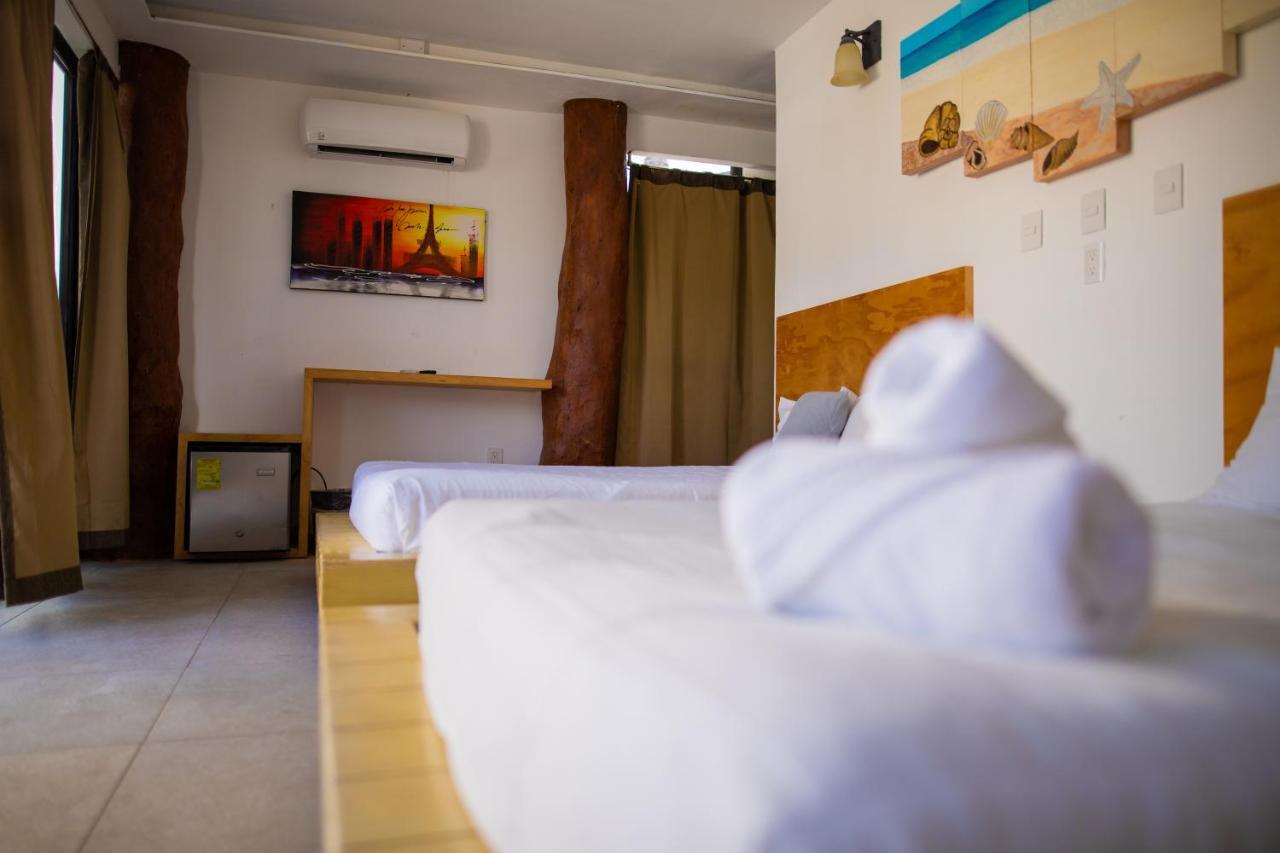 פוארטו מורלוס Hotel & Beach Club Ojo De Agua מראה חיצוני תמונה