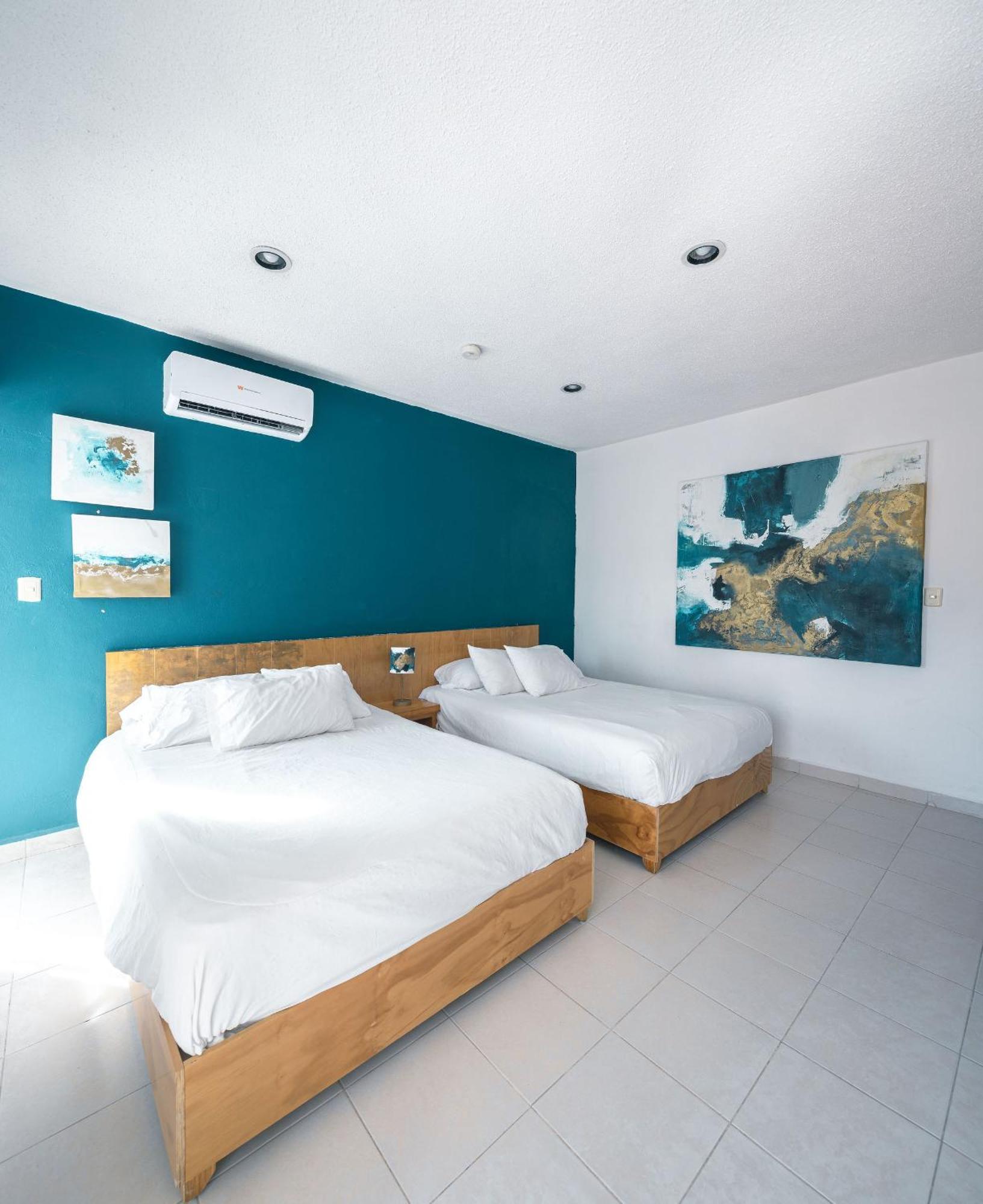 פוארטו מורלוס Hotel & Beach Club Ojo De Agua מראה חיצוני תמונה